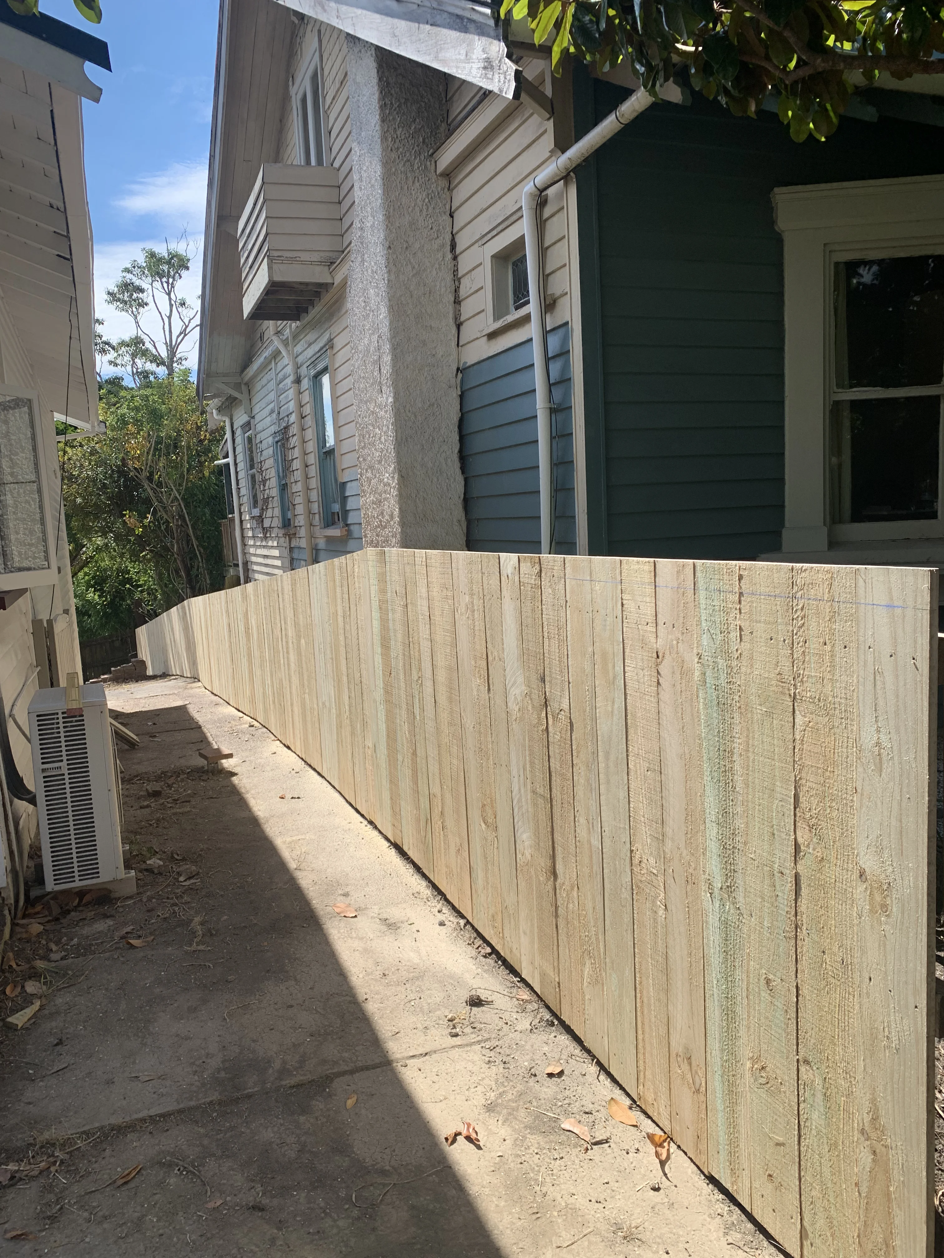 Timber boundary fence installed by O'Neill Construction